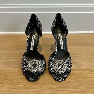 Manolo Blahnik Sedaraby peep toe with clear crystal buckle.